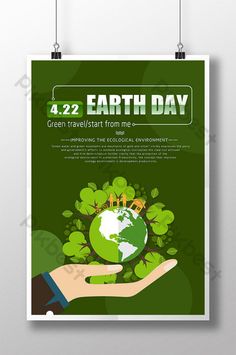 a green earth day poster hanging on a wall