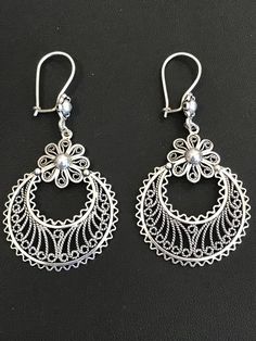 Unique sterling silver Bohemian floral drop earrings. Handmade in Turkey. Traditional Dangle Flower Earrings, Bohemian Jewelry With Intricate Flower Design, Bohemian Flower Jewelry With Intricate Design, Traditional Sterling Silver Flower Earrings For Pierced Ears, Traditional Silver Drop Flower Earrings, Traditional Sterling Silver Earrings In Flower Shape, Sterling Silver Dangle Earrings With Intricate Design, Ornate Round Earrings, Traditional Sterling Silver Flower Earrings