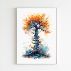 an art print of a tree with orange and blue leaves on the top, in front of a white wall