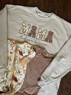 Made to order, personalized crewneck sweatshirt. After you purchase, I will send you a message with where to send your baby items. Message me with customization requests! I'd love to help you create your perfect piece! Want to upgrade to a Comfort Colors crewneck sweatshirt? Add this listing to your cart: https://mamabearshopkh.etsy.com/listing/1686706737 Want to send in your own sweatshirt? Order here: https://mamabearshopkh.etsy.com/listing/1622032527 Want a t-shirt instead of a sweatshirt? Or Applique Sweatshirt, Baby Outfit, Reusable Shopping Bags, Baby Outfits, Mama Shirt, Applique Designs, Baby Items, Unisex Fashion, Comfort Colors