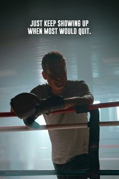 a man standing next to a boxing ring with his hands on his hips and the words, just keep showing up when most would quit out