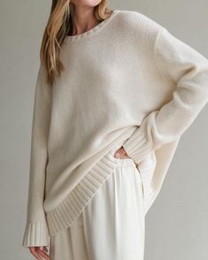 Neutral Cashmere Sweater, Classic Cream Sweater In Relaxed Fit, Classic Cream Sweater For Loungewear, Classic Winter White Relaxed Fit Sweater, Classic Cream Sweater Relaxed Fit, Winter White Relaxed Fit Sweater For Layering, Elegant Crew Neck Sweater For Loungewear, Classic Neutral Crew Neck Sweater, Classic White Relaxed Fit Sweater