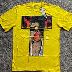 Brand New With Tags. Yellow Trukfit Graphic T Shirt. Multiple Sizes Available Tan T-shirt For Spring Streetwear, Trendy Yellow T-shirt For Streetwear, Urban Style Yellow Tops With Graphic Print, Urban Style Yellow Graphic Print Tops, Urban Style Yellow Cotton Tops, Urban Yellow T-shirt With Graphic Print, Yellow Summer Streetwear T-shirt, Urban Yellow Summer Tops, Trendy Yellow T-shirt With Relaxed Fit