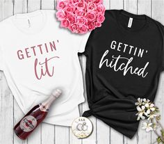 two t - shirts with the words gettin'litt, and a bottle of wine