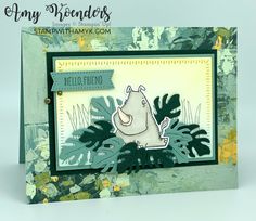 a handmade card with an image of a hippo in the jungle on it