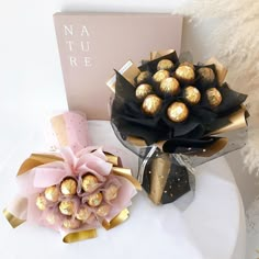 a bouquet of chocolates and a card on a table