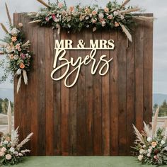 a wooden sign that says mr and mrs byers