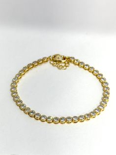 14k. Vermeil over sterling silver bracelet length 6.25-7.25. Extender chain for adjustable sizing. Diamond Tennis Bracelet, Bezel Set Diamond, Tennis Bracelet Diamond, Sterling Silver Bracelet, Tennis Bracelet, Bezel Setting, Sterling Silver Bracelets, Silver Bracelet, Tennis