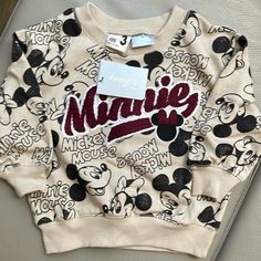 Cotton On License Disney Minnie Mouse Fleece Crew Neck. Size 3. New With Tags. Cute Mickey Mouse Tops For Fall, Cute Minnie Mouse Tops For Fall, Playful Mickey Mouse Top For Winter, Cute Long Sleeve Mickey Mouse Tops, Cute Winter Mickey Mouse Sweatshirt, Cute Mickey Mouse Cotton Sweatshirt, Cute Mickey Mouse Winter Sweatshirt, Minnie Mouse Cotton Sweatshirt For Winter, Playful Mickey Mouse Winter Top