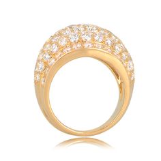 From the Cartier Nigeria collection. This ring is dazzled with collection grade round brilliant cut diamonds with a total approximate weight of 4.10 carats, D-F color, and VVS clarity. This ring is 18k yellow gold, and is signed Cartier, numbered, and has maker marks and French mark’s stamped on the back.
The mm width of the diamond section graduates from 17.50mm – 12.30mm.
The current size of this ring is 7.
If you have any questions about this Cartier Nigeria ring, please feel free to contact us. Luxury Yellow Gold Round Diamond Ring, Luxury Yellow Gold Diamond Ring, Yellow Gold Dome Ring With Brilliant Cut Diamond, Luxury Yellow Gold Dome Ring With Diamonds, Yellow Gold Dome Ring With Cubic Zirconia Round Cut, Yellow Gold Dome Ring With Cubic Zirconia, Yellow Gold Cubic Zirconia Dome Ring Round Cut, Luxury Diamond Ring With Single Cut Diamonds, Luxury Yellow Gold Dome Ring With Brilliant Cut