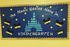 a bulletin board with mickey mouse's castle and the words, the magic begins here in