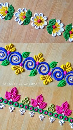 three different types of embroidered flowers on a wooden surface