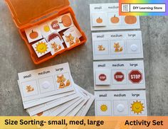 a set of matching cards with an orange case filled with small pictures and text that reads size sorting - small, medium, large activity set