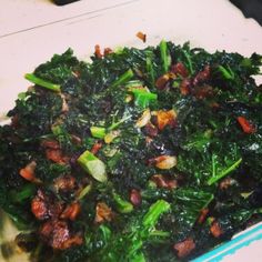 a close up of a plate of food with broccoli and other vegetables on it