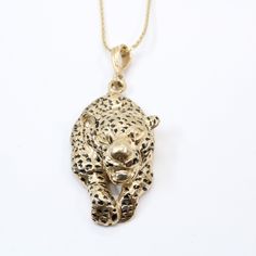 How about this running Jaguar I designed as something unique?  If you love this beautiful animal this should be a necklace you will enjoy having.  This would make a great gift for him or her is you love big cats or are going to Jacksonville Football games.   This is a 14kt Solid Gold Running Jaguar Necklace made in solid 14kt gold with hand enameled black spots.  The gold weight is 9.3 grams including the chain.  The pendant only weighs 7.3 grams.  I hand carved all the tiny intricate detail of Jaguar Necklace, Leopard Necklace, Jaguar Print, Football Birthday, Safari Birthday, Necklace Chain Lengths, Disney Jewelry, Cat Lover Gift, Big Cat