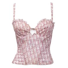 Indulge In The Whimsical Charm Of The Christian Dior Diorissimo Girly Pink Bustier Top In Size 32c. This Delightful Piece From The Spring 2004 Girly Collection By John Galliano For Christian Dior Features A Playful Pink And White Diorissimo Print, Accentuated With An Applique Leather Flower For Added Flair. Boasting A Ruffled Bust, Removable Straps, And A Sparkling Rhinestone Dior Logo Accent, It Exudes Femininity And Sophistication. Recommended For Sizes Xs/S, This Bustier Top Is A Statement Piece. Measurements Are Provided As A Guide: Length 17", Width 10"/10.5", Bust 13", Bottom Opening 11", Sleeve Width 0.5". Detailed Photos Reveal Any Discoloration Or Stains Present. Embrace Its Vintage Pink Tops For Women Classy, Dior Aesthetic Clothes, Dior Outfits Women, Dior Bustier, Christian Dior Aesthetic, Pink Sparkly Top, 2000s Dior, Graphic Tees Design Prints, Pink Bustier Top