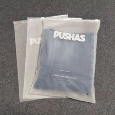 three bags with the words pushas on them are sitting next to each other in front of a carpeted floor