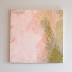 an abstract painting on the wall with pink and green colors