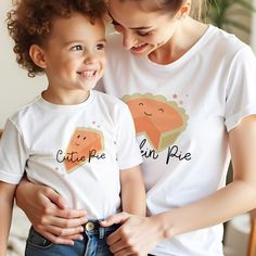 Mama and Mamas Little Pumpkin Toddler tee shirt and baby bodysuit.  UNISEX T-SHIRT * Medium fabric, consisting of high quality, 100% ring-spun US cotton for long-lasting comfort. * The relaxed fit keeps the wearer comfy in both casual and semi-formal settings while the crew neckline delivers that classic, neat style which makes it perfect for accessorizing.  *  The pre-shrunk fabric ensures a consistently great fit.  * Made using 100% US cotton that is ethically grown and harvested. Gildan is al Cute Summer T-shirt For Parenting, Family Matching Cartoon Print Cotton Tops, Cute Crew Neck Top For Family Occasions, Cute Family T-shirt With Funny Print, Family Matching Cotton Tops With Cartoon Print, Casual Family T-shirt With Cartoon Print, Cute Crew Neck Top, Casual Cartoon Print T-shirt For Family, Casual T-shirt With Cartoon Print For Family