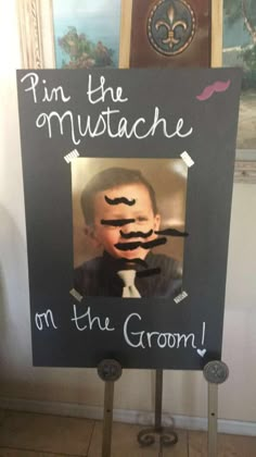 a sign that says, i'm the mustache on the groml in front of