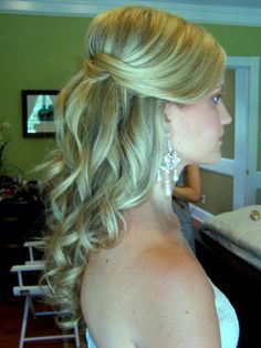 a woman getting her hair done in a salon