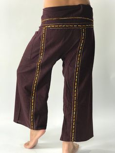 "Unisex Thai fisherman pants. One size fits all. You can wear in many occasions, casual wear, yoga wear, maternity wear, relax at home, travel etc. If you are looking for some pants that you can wear everywhere, comfortable, relax and Easy to wear. Thai fisherman pants is Answer!! Nice gift for yourself or your lover One pocket on the side for storing your items such as wallets, mobile phones, etc Approx. Measurements: One size can fits most and 1 Pockets Measurement Waist 27\" (69 cms) Length 4 Brown Cotton Ankle-length Harem Pants, Hippie Cotton Bottoms For Meditation, Cotton Yoga Pants For Meditation, Traditional Wide Leg Bottoms With Elastic Waistband, Hippie Cotton Yoga Bottoms, Cotton Yoga Pants With Elastic Waistband For Meditation, Brown Full Length Yoga Pants, Traditional Cotton Bottoms For Meditation, Cotton Hippie Wide Leg Yoga Pants