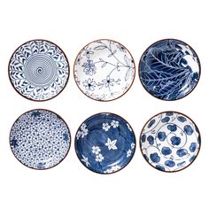 six blue and white plates with designs on them