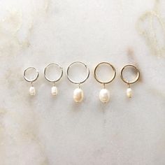 Minimalistic hoop earrings with a freshwater pearl  Price per Delicate White Hoop Earrings With Pearl Drop, Minimalist Pearl Earrings With Charm, Silver Huggie Pearl Earrings For Everyday, Minimalist Teardrop Hoop Earrings With Pearl Charm, Minimalist Pearl Dangle Huggie Earrings, Silver Huggie Earrings With Pearl Drop, Dainty Pearl Pendant Earrings For Everyday, Dainty Pearl Huggie Hoop Earrings, Dainty Everyday Pearl Pendant Earrings