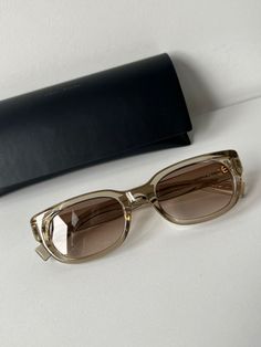 Brand new Saint Laurent SL642 005 Beige Unisex Sunglasses. Comes with case, cloth, and papers.Made in Italy. Size 52-21-145. Unisex. Designer Sunglasses With Tinted Lenses For Everyday, Modern Beige Sunglasses For Formal Occasions, Designer Sunglasses With Gradient Lenses For Everyday, Designer Beige Sunglasses With Tinted Lenses, Classic Beige Glass Sunglasses, Designer Beige Sunglasses With Gradient Lenses, Men's Eyeglasses, French Guiana, Unisex Sunglasses