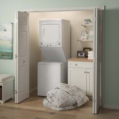 a washer and dryer in a small room