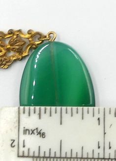 "Vintage gold tone and large green agate necklace ( A ), In good vintage condition. Necklace 18\" long, 2\" Extended. Green agate 1\"3/8 x 7/8 and 5 mm thick. 1\" ¼ x 7/8\" and 5 mm thick. Weighs 1.1 Oz. Thanks." Jade Cabochon Oval Pendant Necklace, Green Cabochon Oval Pendant Necklace, Formal Gold Jade Necklaces, Formal Gold Jade Necklace, Oval Jade Gold Necklace, Vintage Oval Jade Necklace, Adjustable Gold Cabochon Necklace, Green Oval Necklace For Formal Occasions, Formal Green Oval Necklace