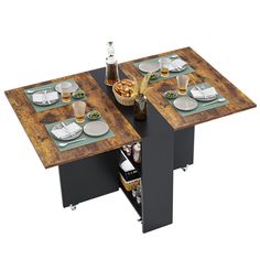 two tables that have plates and glasses on them