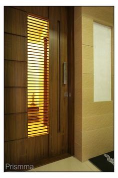 a bathroom with wooden shutters on the door and window blinds in the shower area