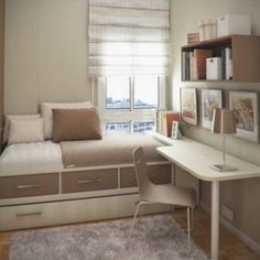 a room with a bed, desk and bookshelf on the wall in it