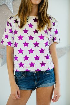 PURPLE STAR SEQUIN TOP TOP Judith March Fitted Star Print T-shirt For Summer, Fitted Star Print Top For Night Out, Fitted Star Print Tops For A Night Out, Purple Summer Top For Night Out, Purple Top For Summer Night Out, Purple Summer Tops For Night Out, Purple Short Sleeve Top For Party, Star Print Tops For Night Out In Spring, Short Sleeve Tops For Night Out Party Season