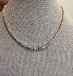 This is the holy grail for Moi! I love bezel set diamonds but bezels require more gold. This half diamond necklace gives the same bezel look without a cost of a full tennis necklace. 2 ctw round diamonds (47 stones) set in 14k yellow gold and extended with gold balls on the sides. Adjustable length 15-17" extender. weight: 10.8g Baguette Necklace, Diamond Tennis Necklace, Spike Necklace, Crescent Moon Necklace, Bezel Set Diamond, Tennis Necklace, Cluster Pendant, Holy Grail, Evil Eye Necklace