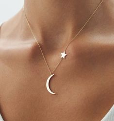 14k Solid Gold Crescent Moon and Star Sideways Necklace, Crescent Moon Star Asymmetric Necklace, Real Gold Jewellery, Celestial Necklace Material: Solid Gold Karat: 14 K (585) Approximate weight : 1,60 gram Want to Check Out More from Our Sections FİEMMA http://www.etsy.me/3ukWhje Gold Rings http://www.etsy.me/39E9NGS Gold Necklaces http://www.etsy.me/31NdjtO Gold Bracelets http://www.etsy.me/2QT9SzF Gold Earrings http://www.etsy.me/3mfSmRK Gold Pendants http://www.etsy.me/3uiXrLZ Gold Chains ht Minimalist Moon-shaped Jewelry With Star Charm, Asymmetric Necklace, Necklace Real Gold, Crescent Moon And Star, Gold Crescent Moon, Gold Pendants, Real Gold Jewelry, Celestial Necklace, Small Jewelry Box