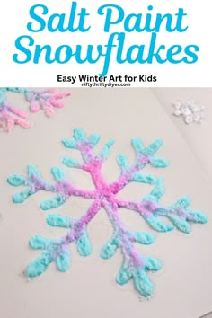 an easy snowflake art project for kids to make with salt paint and glue