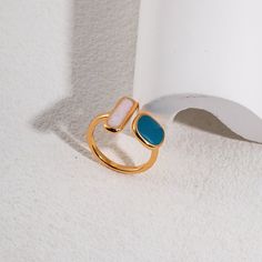 This vintage style ring features a simple design with a hint of sophistication. The open silhouette adds a modern twist to a classic look, making it a versatile accessory for any occasion. This ring is carefully crafted to easily enhance your style with its unique and sophisticated beauty. Metal: 18K Recycled Gold Plated Vermeil on Recycled Sterling Silver,Enamel Glaze Ring Dimensions: Width 14mm Size: Open Edison Pearls, Vintage Style Rings, Tiger Eye Stone, Recycled Gold, Recycled Sterling Silver, Silver Enamel, Open Ring, Stone Necklace, Classic Looks