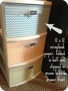 three drawers stacked on top of each other with the words scrapbook paper folded in half