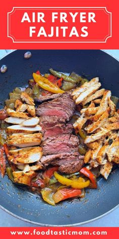 an air fryer with steak and peppers in it on top of a blue plate