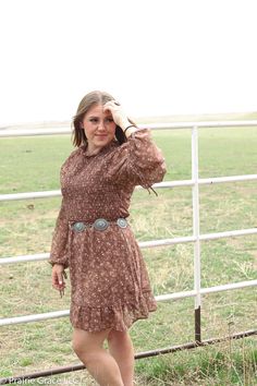 This beautiful long sleeve floral print smocked bodice mini dress is one we know you will love in stunning brown tones! This dress is perfect for any occasion with great details of ties and sheer sleeves! Fitted Brown Smocked Dress With Smocked Back, Brown Fitted Smocked Dress With Smocked Back, Brown Bohemian Dress With Smocked Bodice, Casual Brown Long Sleeve Dress, Flowy Brown Smocked Dress With Smocked Bodice, Brown Smocked Dress With Ruffles For Fall, Bohemian Brown Mini Dress For Fall, Bohemian Long Sleeve Mini Dress With Smocked Bodice, Flowy Long Sleeve Smocked Dress For Fall