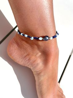 Larimar, Lapis Lazuli and Peacock Fresh Water Pearl Anklet ~* Anklet *~  Anklet Design: Pearl in the Center, Larimar, Double Strand Lapis Lazuli Pattern All Over Ending: Sterling Silver, Sterling Silver Clasp Gemstone Sizes: Peacock Fresh Water Pearl 10-11mm Larimar 4-5mm Lapis Lazuli 1.8mm Very Beautiful and Lightweight Larimar, Lapis Lazuli and Fresh Water Pearl Anklet Made to Order According Your Desired Size  *Please Reach Me If You Need Custom Size Not Listed in the Selection *Please Reach Me If You Want Matching Anklets for Your Kids Visit the Shop for More Jewelry  Please Reach Me If You Have Any Questions ~* Thank You for Being Here *~ You Are Divine Blue Strand Anklets For Festivals, Blue Ankle Wrap Anklets For Festival, Blue Bohemian Ankle Wrap Anklet, Blue Bracelet Anklets For Beach, Handmade Blue Anklets For Vacation, Flexible Blue Jewelry For Beach, Blue Flexible Jewelry For The Beach, Flexible Blue Beach Jewelry, Handmade Blue Anklet As Gift