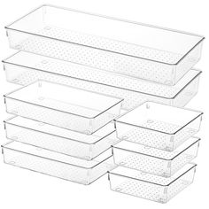 six clear plastic storage containers with polka dots on the bottom and bottom, all stacked together