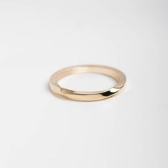 Twisted Wedding Band Ring for Women 14K Solid Gold Mobius - Minimalist Stacking Gold Ring  A handmade wedding ring of 14k solid gold with softened edges for comfort. Engrave the ring with no extra cost. 100% handcrafted with love! D E T A I L S ● Metal: 14K solid gold, 14K white gold ● Dimensions: measures 2.1 mm in width x 2.2mm thick R I N G ∙ S I Z I N G For General Reference: ● we use standard US Ring Sizing ● an average women's ring finger is size 6-7 and an average men's ring finger is siz Wedding Rings With Smooth Finish And Round Band, Wedding Rings With Smooth Finish, Timeless Smooth Finish Wedding Rings, Wedding Ring With Smooth Finish And Round Band, Modern Twist 14k Gold Wedding Jewelry, Minimalist Stackable Couple Rings For Formal Occasions, Modern Simple Design Wedding Rings, Minimalist Wedding Jewelry With Smooth Finish, Modern Simple Wedding Rings