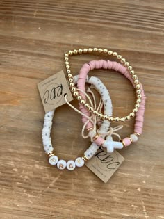 Dusty rose cross band paired with a solid accent band and pray band. Sorority Beaded Bracelets, Cross Beaded Bracelet, Christian Friendship Bracelets, Christian Beaded Bracelets, Christmas Bracelet Ideas, Name Bead Bracelet, Cross Bracelets, Glow Jewelry, Faith Bracelet