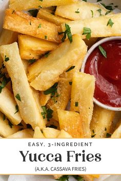 yucca fries with ketchup and parsley in a white bowl on a table