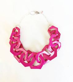 Oversized chunky chain necklace entirely handmade link by link from polymer clay in magenta pink, finished with silver or gold plated chain. Lobster clasp closure on the back. ►Length: From 18 to 30 inches // Modeled necklace is 28 inches long (71cm) and is for size reference only! You can find the modeled red link necklace here: https://www.etsy.com/shop/AlinaandT?ref=seller-platform-mcnav&search_query=red+link ►Chain links are approx 2 3/4 - 2 1/2 long inch and smaller in the ends of the n Pink Chunky Chain Jewelry For Party, Pink Chunky Chain Necklace For Gift, Pink Chunky Chain Link Necklace, Pink Chain Link Necklace For Gift, Pink Chain Link Necklace With Adjustable Chain, Pink Chunky Chain Necklace As Gift, Pink Chunky Chain Link Jewelry, Pink Chunky Link Chain Jewelry, Bold Pink Jewelry For Gifts