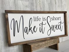 a sign that says life is short make it sweet