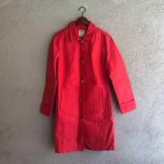 Add A Pop Of Color To Your Ootd With This Poppy Colored Coat. Complementary Brown Button Closure. One Sleeve Button Broke But This Comes With An Extra Replacement Button. Mark On One Side, Possibly Paint From Being Stored And Might Come Off When Washed. Spring Outerwear With Buttoned Pockets For Daywear, Spring Daywear Outerwear With Buttoned Pockets, Trendy Red Outerwear With Button Closure, Trendy Outerwear With Button Closure For Daywear, Red Single Breasted Cotton Outerwear, Red Single-breasted Cotton Outerwear, Red Cotton Outerwear For Spring, Casual Red Outerwear With Snap Buttons, Red Cotton Button-up Outerwear